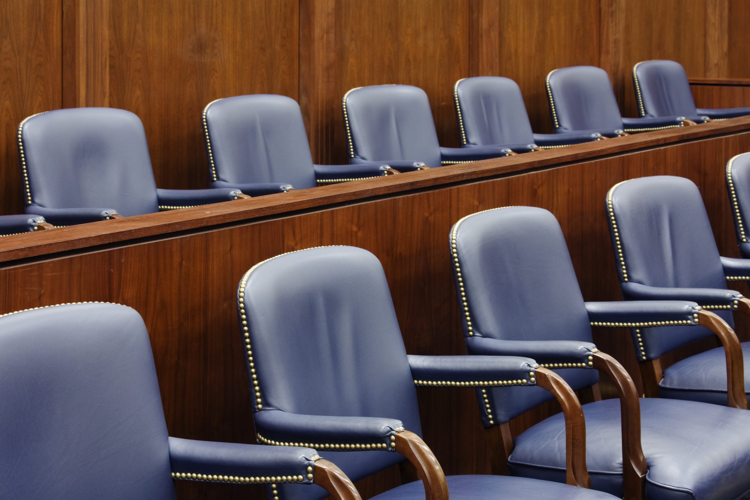 Empty Jury Seats in Courtroom